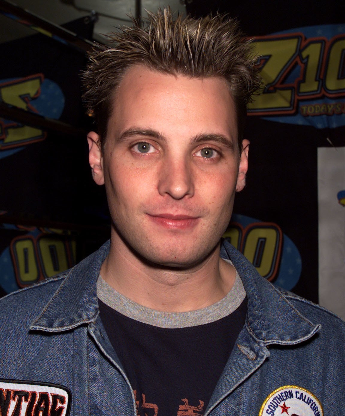 A close-up shot of Rich with frosted tips at Z-100 event in the early 2000s