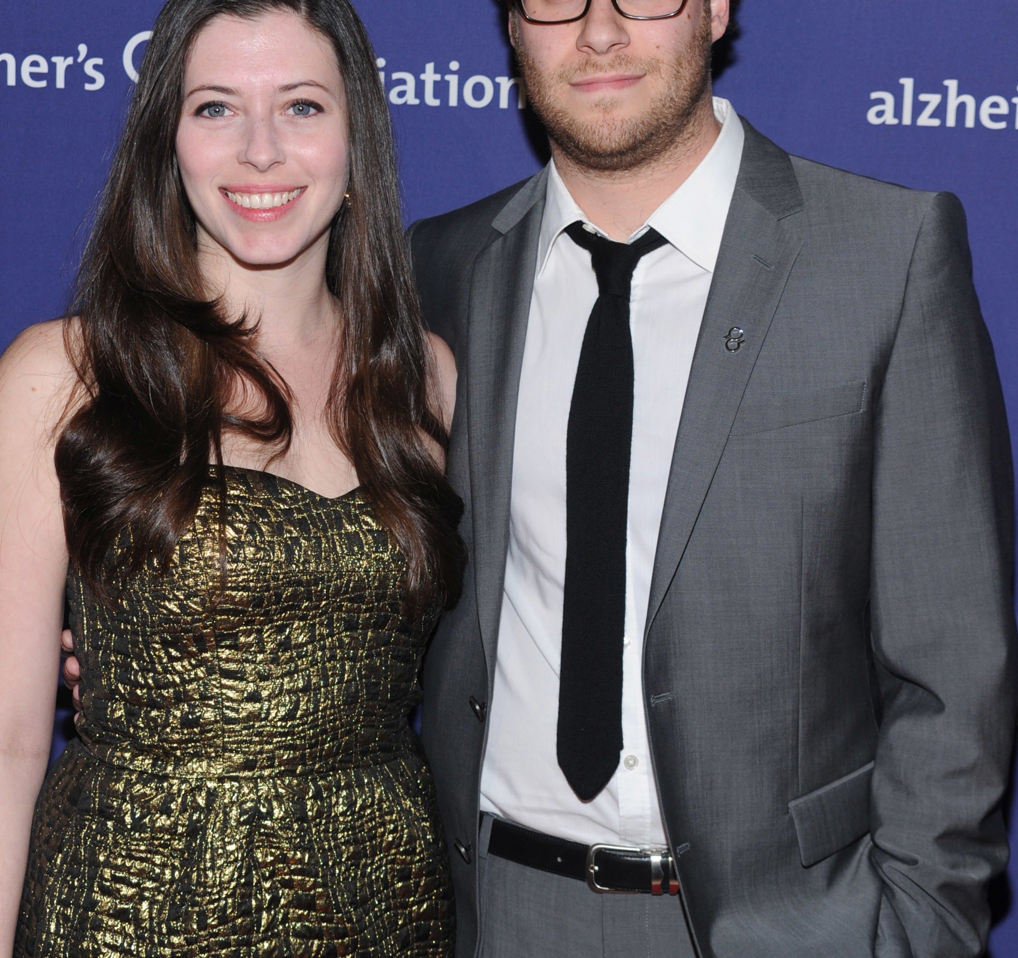 Lauren Miller and Seth Rogen on a red carpet for a fundraiser in 2010