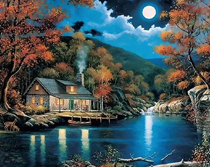 Picture of a moonlit cabin,