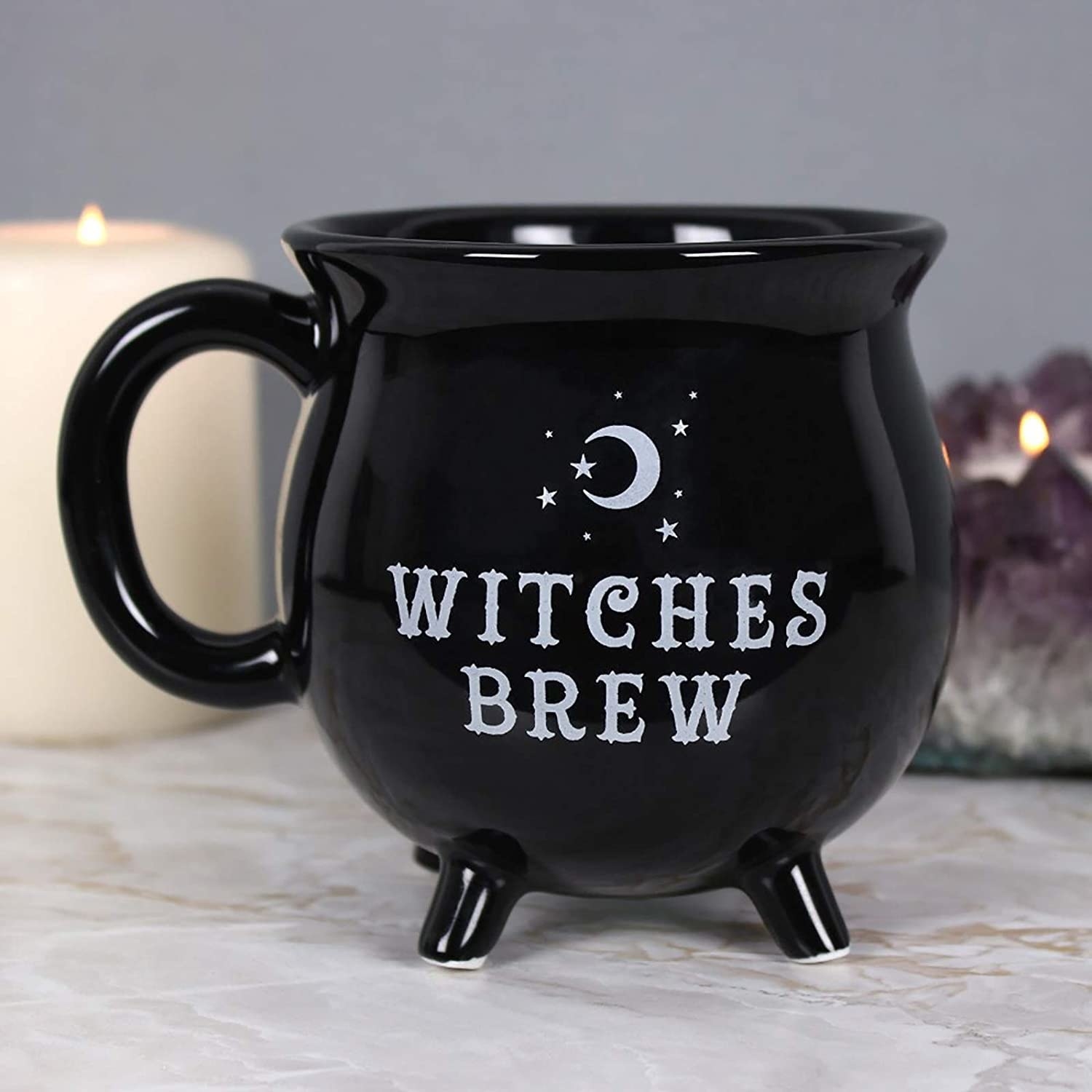 A large coffee mug with the words witches brew written on one side