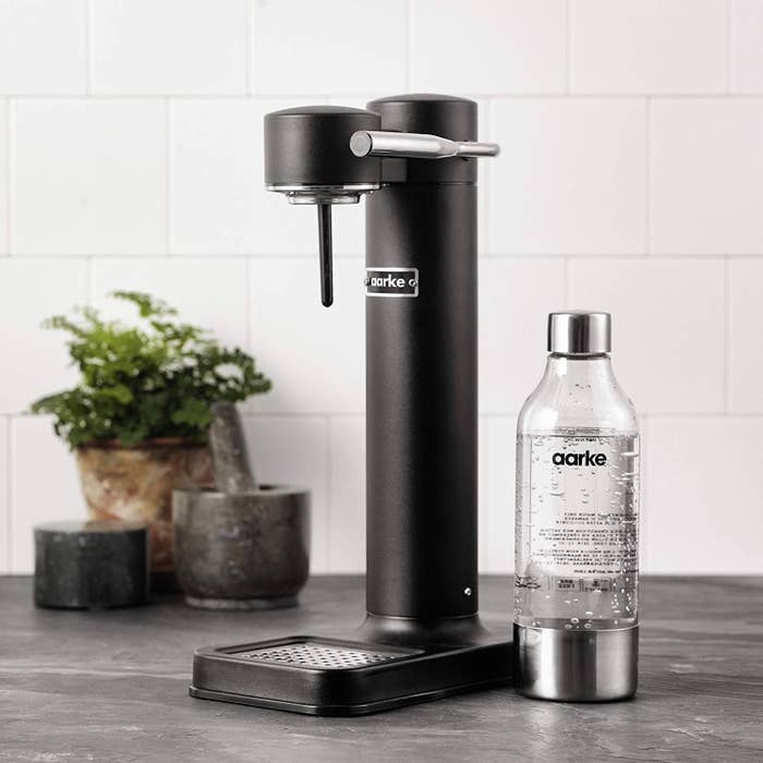 Sleek black sparkling water maker