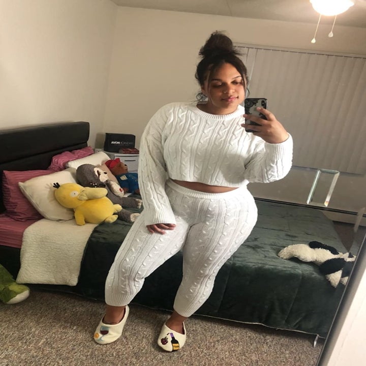 Reviewer in the white cropped sweater and leggings set