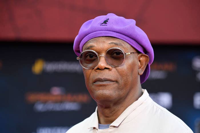 Samuel L. Jackson wearing a hat and sunglasses