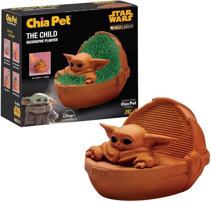 The planter shaped like Baby Yoda in his basket and the box, which shows how the plants will grow in the lining of the basket all around him