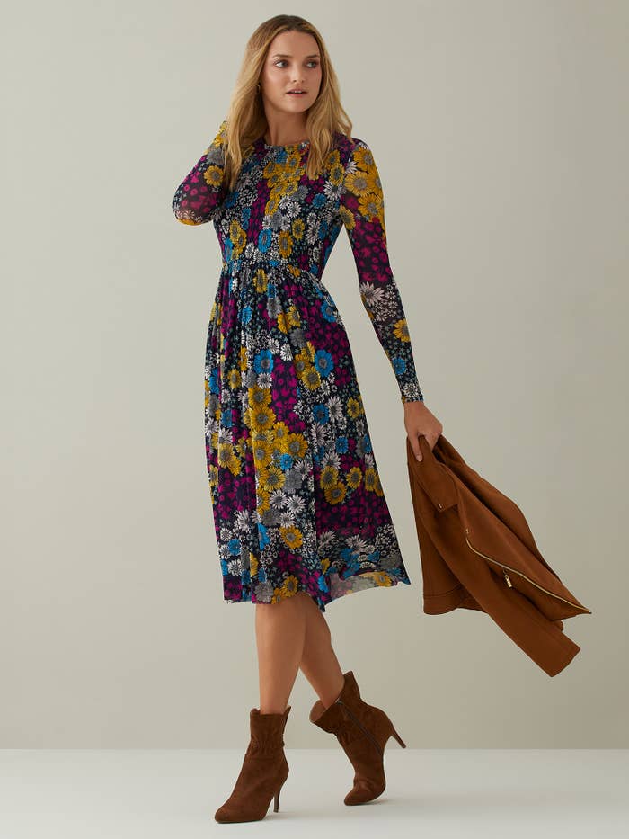The floral-printed navy blue knee-length dress