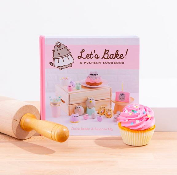 The book, which features Pusheen shaped cakes, cookies, and candies on the cover