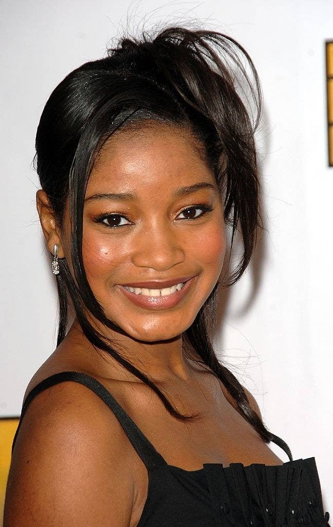 Young Keke smiling