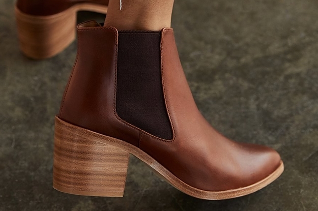 model wearing brown ankle boots