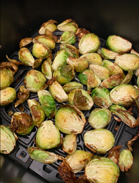 Brussels Sprouts heating up in the air fryer.