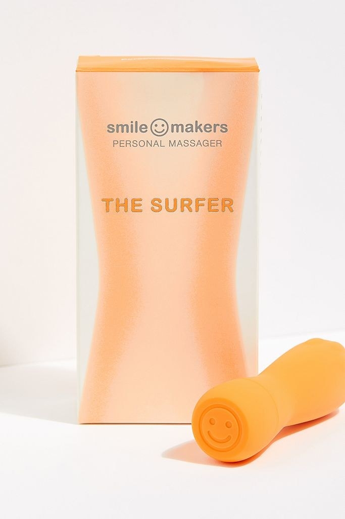 Orange vibe with smiley face printed on end