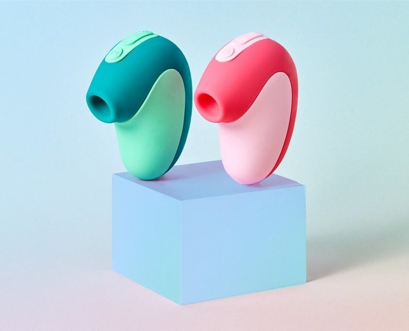 Two curved suction toys side-by-side