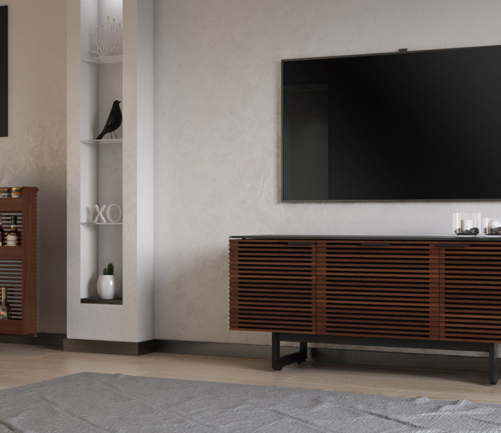 The triple-wide cabinet with wood slotted front and black metal legs under a TV in a living room.