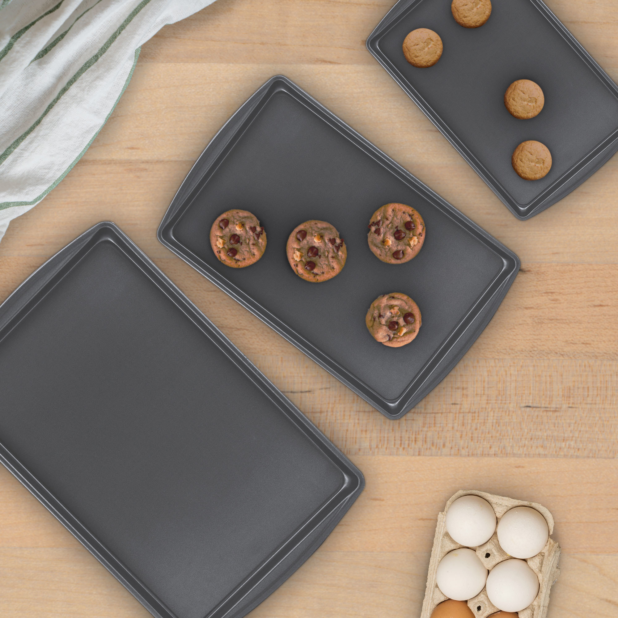 three sheet pans on a counter