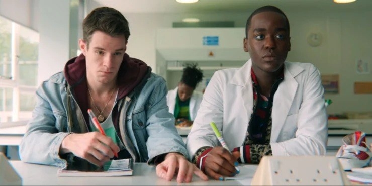 &quot;Sex Education&quot; characters Adam and Eric subtly flirting in their shared science class