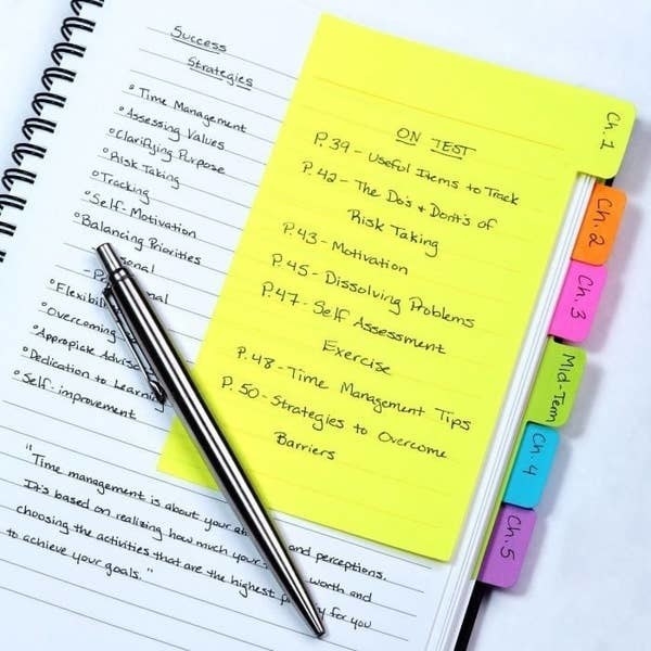 The colorful divider tabs in a notebook outlining notes for various chapters