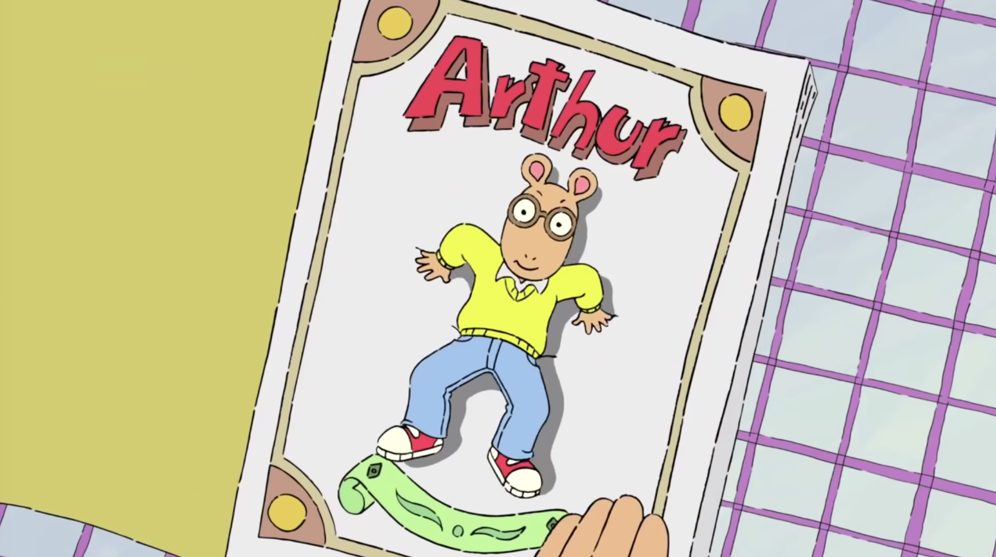 &quot;Arthur&quot; title card — which is the title on a page in a book featuring the titular character. 