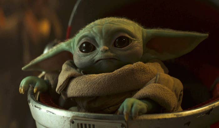 Baby Yoda looking real cute in his space crib