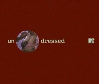 A screenshot for the intro to MTV&#x27;s Undressed which features a hole in the between un and dressed with a clip of two people undressing in it