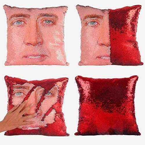 A pillow with Nicholas Cage&#x27;s and red sequins