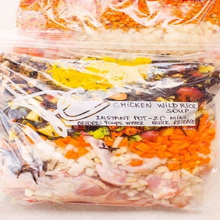 A freezer bag containing the contents of the chicken and wild rice soup.