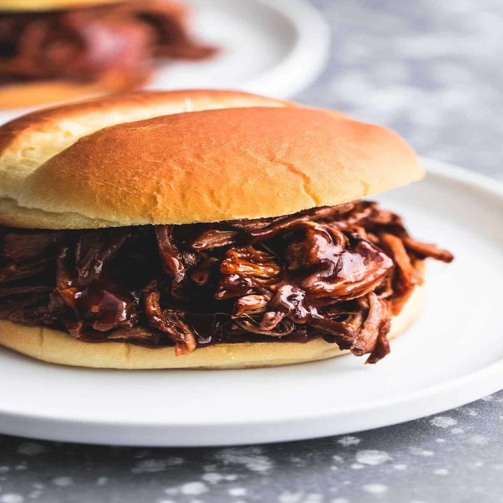 A BBQ pulled pork sandwich on a bun.
