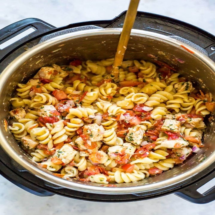 Pasta with chicken and chunks of tomato in the Instant Pot.