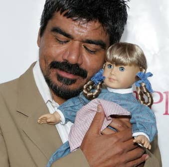 George Lopez with a Kirsten doll