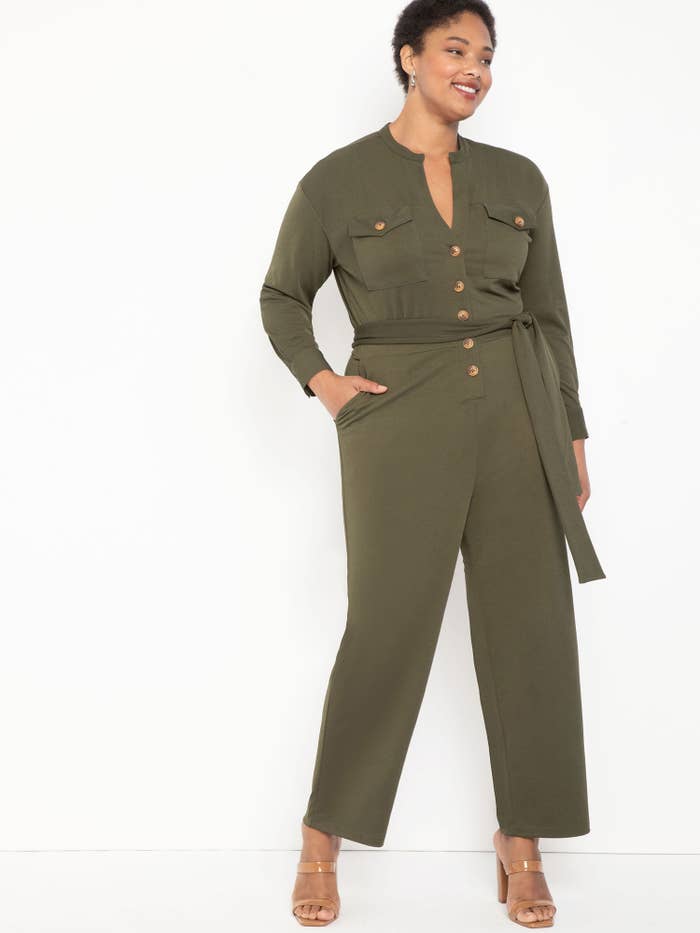 person wearing an olive green jumpsuit