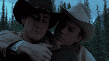 GIF of Heath Ledger hugging Jake Gyllenhaal in Brokeback Mountain