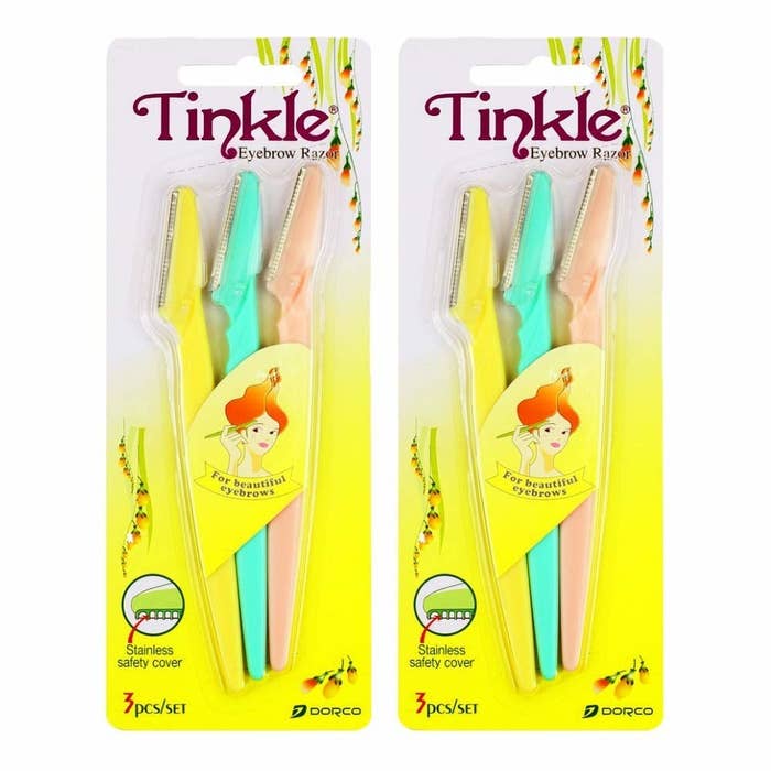 two packs of three razors in different colors