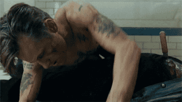 GIF of Viggo Mortensen crawling over a body from Eastern Promises