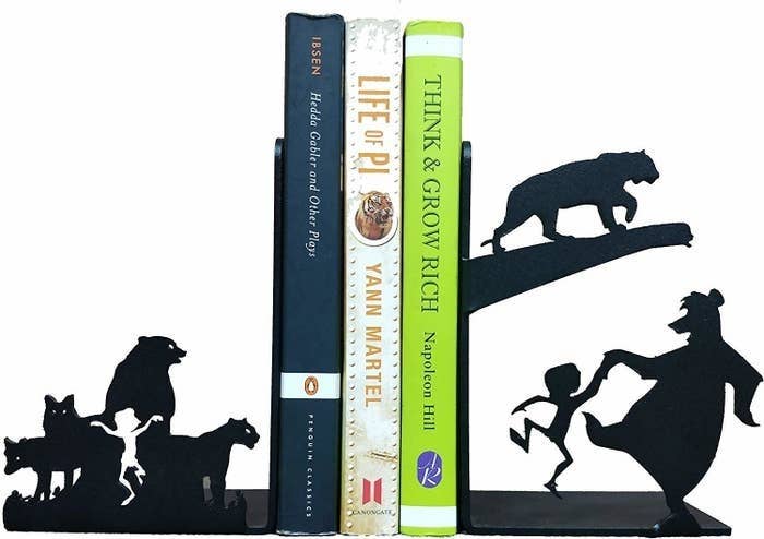 3 books kept in between The Jungle Book themed bookends