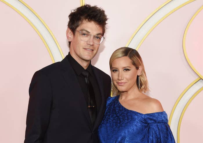 Christopher French and Ashley Tisdale posing together at a Hollywood event