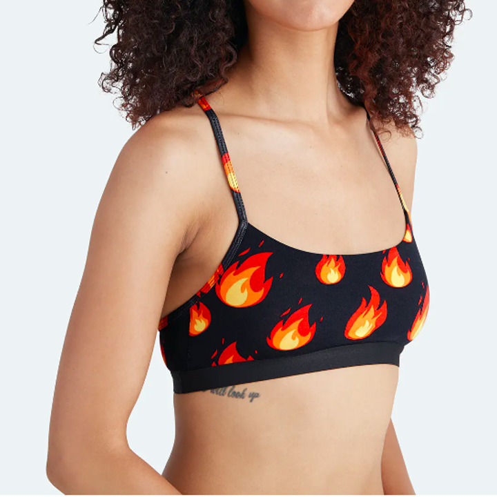 A model wearing the flame-print bralette