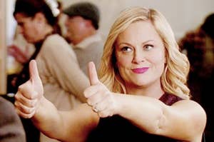 Leslie Knope giving two big thumbs up