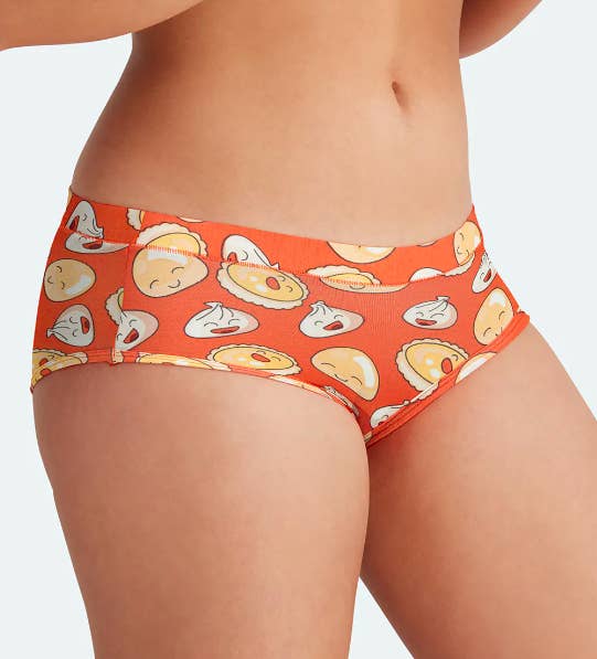 The underwear in orange, featuring a cute dumpling pattern