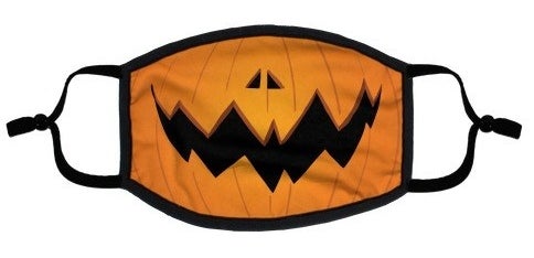 face mask of the bottom half of a jack o lantern smiling 