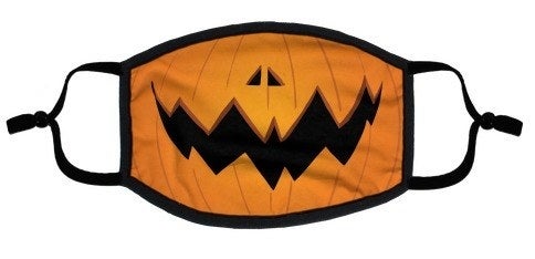 face mask of the bottom half of a jack o lantern smiling