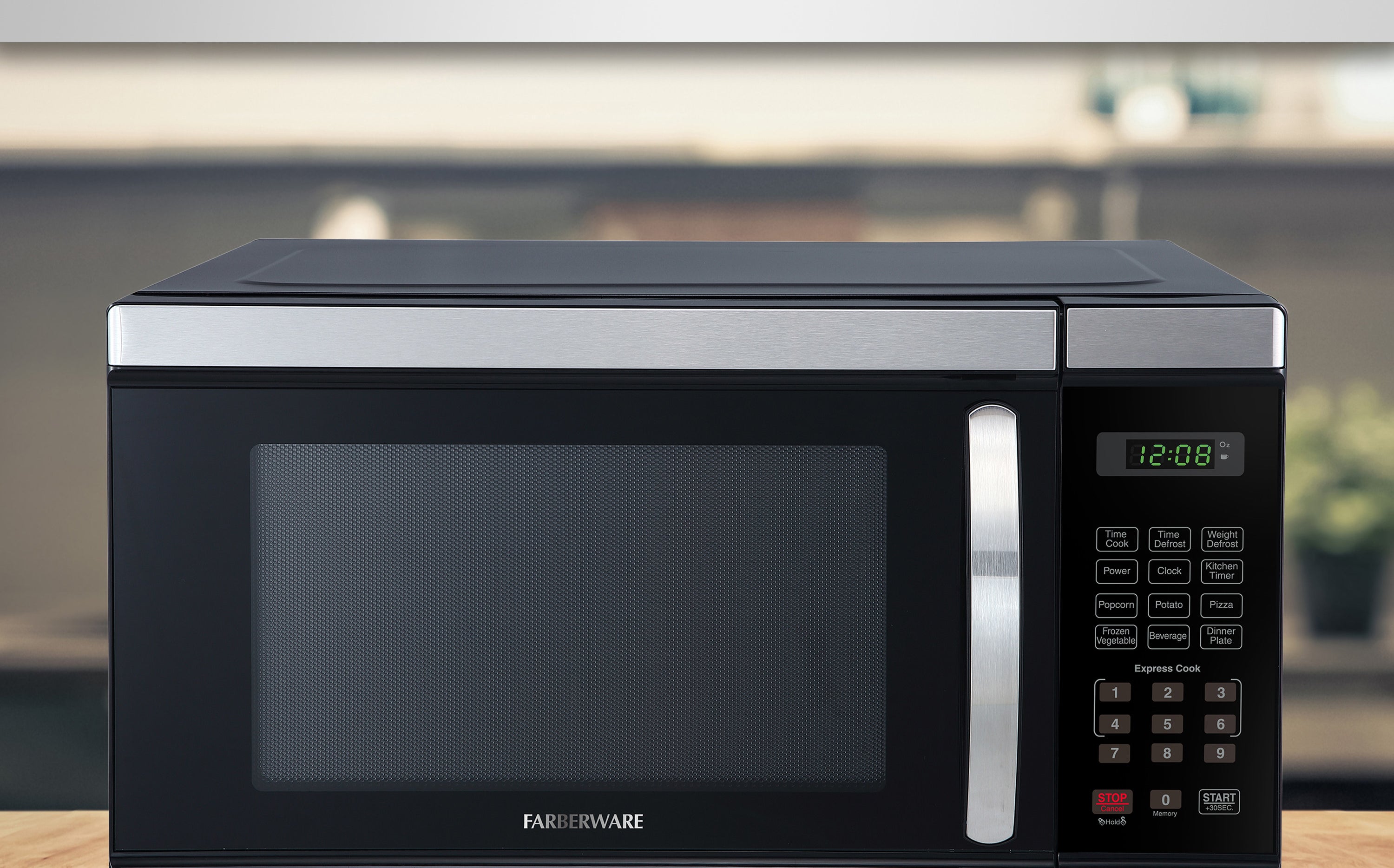 black microwave on a kitchen counter