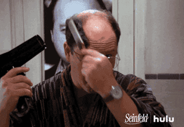 gif of George Costanza drying a patch of hair