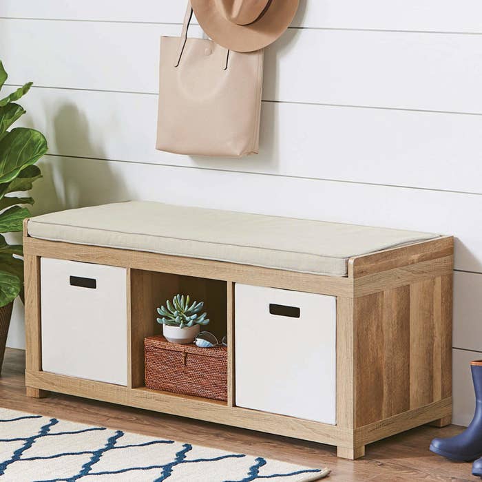 3 cube organizer storage bench in the weathered finish with a tan cushion on top