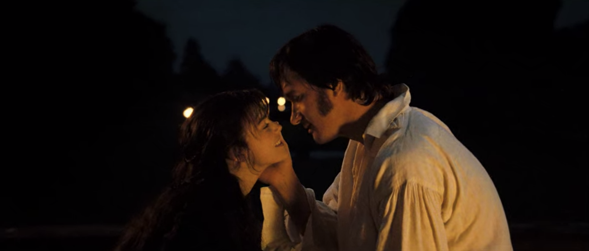 Mr. Darcy caressing Lizzie&#x27;s face. 