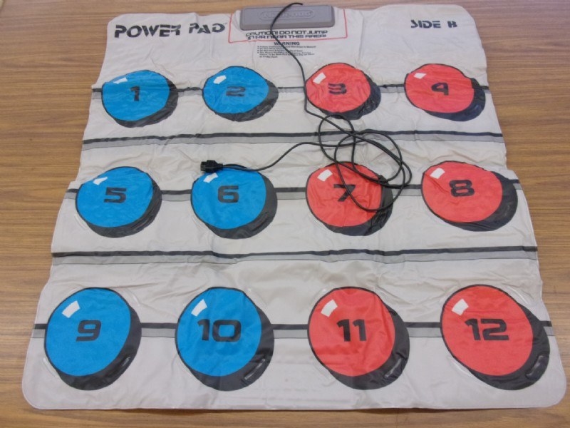 A Power Pad extended on a wood floor