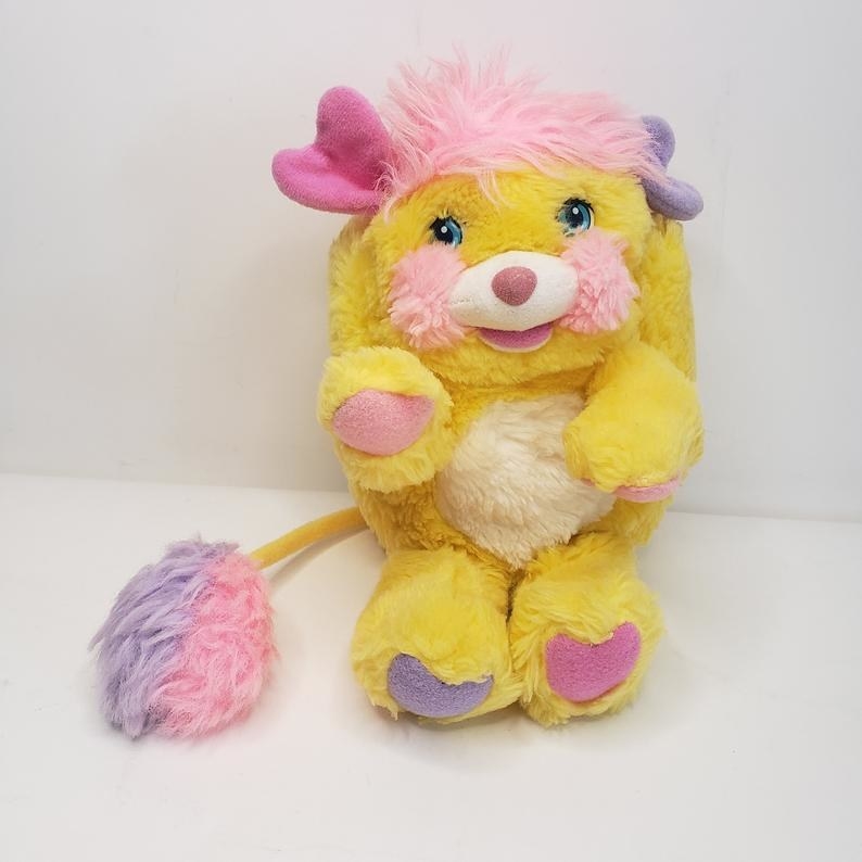 A yellow Popple stuffed animal