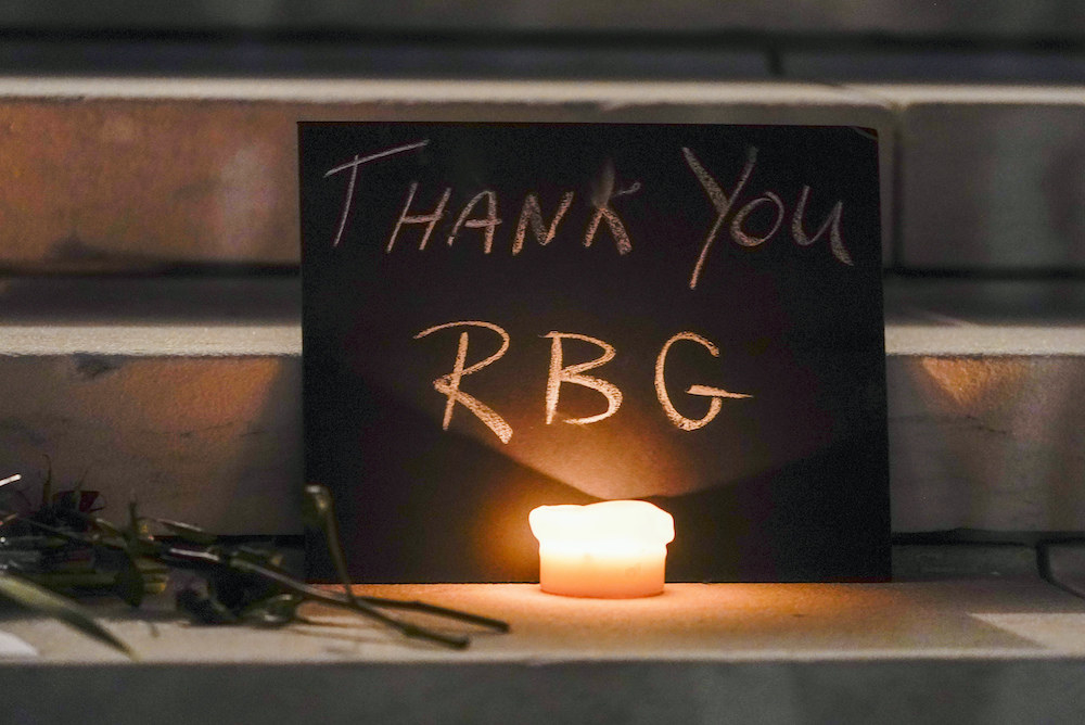 A sign on the Supreme Court steps reads &quot;Thank You RBG&quot; 