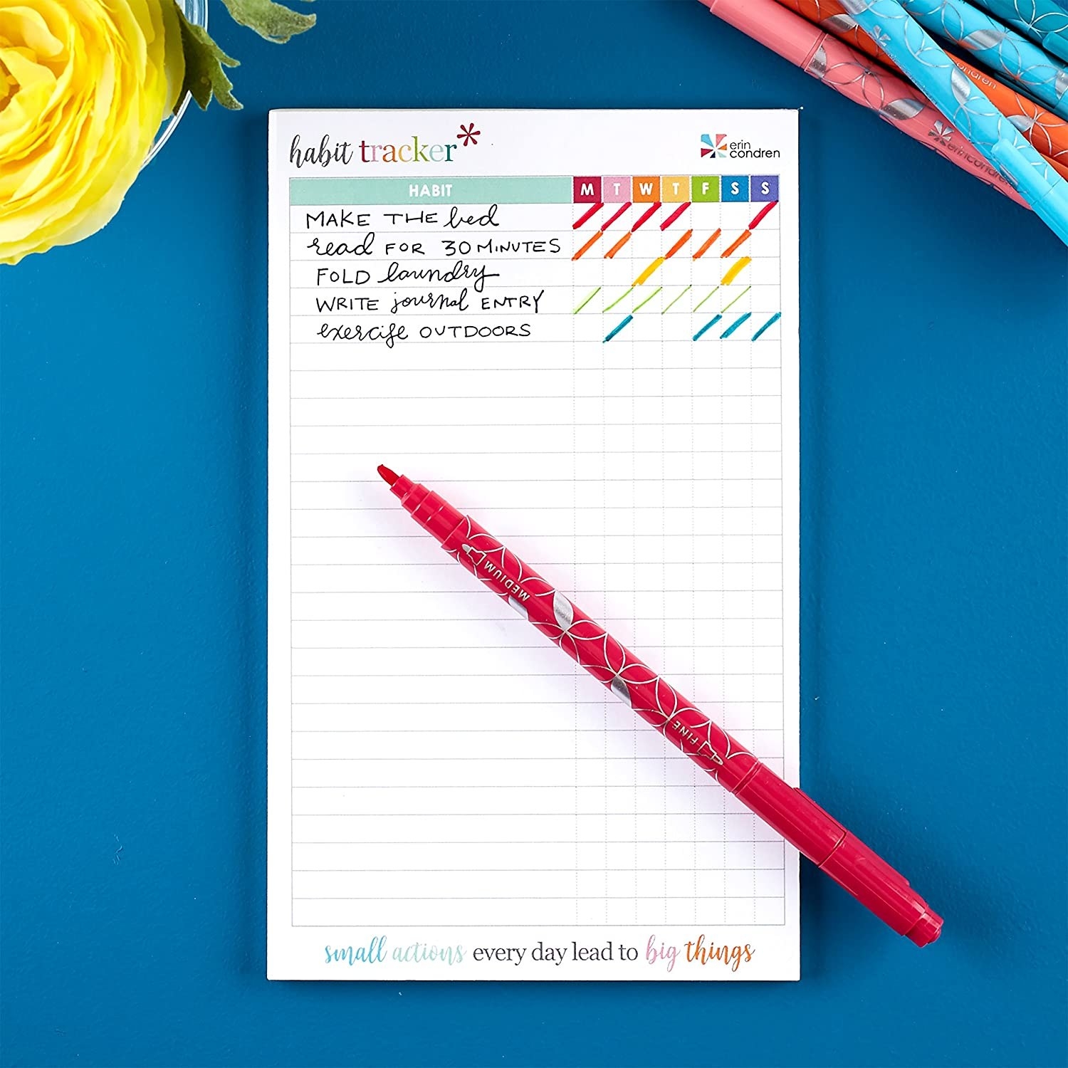The habit tracker with a marker on top of it