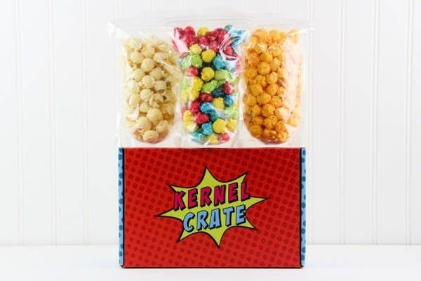 The Kernel Crate box with three different types of unique popcorn in it