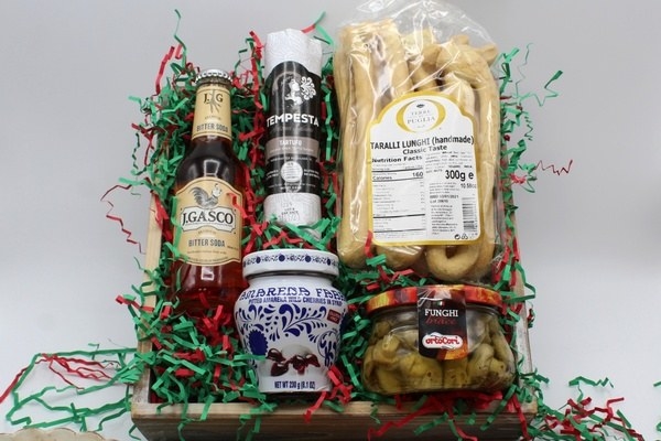 An assortment of gourmet Italian goodies inside of the Gusto di Roma box