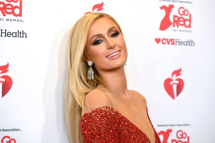 Paris Hilton poses in a bedazzled dress at a Hollywood event
