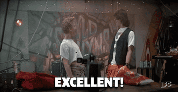 GIF of Bill &amp;amp; Ted from Bill &amp;amp; Ted&#x27;s excellent adventure doing air guitar and yelling Excellent
